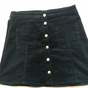 Emerald green corduroy button front skirt